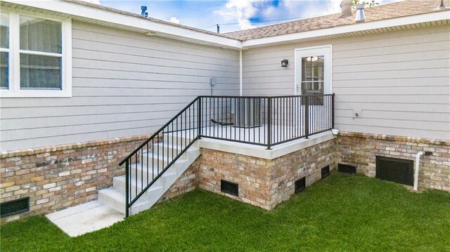 234 Murray Hill Dr, Destrehan, LA 70047 - property entrance featuring a yard and brick siding