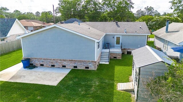 234 Murray Hill Dr, Destrehan, LA 70047 - rear view of house with crawl space and a patio