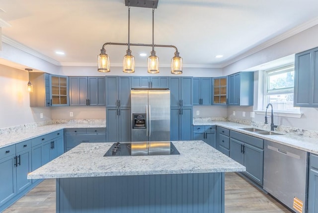 3701 Red Cypress Dr, New Orleans, LA 70131 - kitchen featuring stainless steel appliances, a sink, ornamental molding, blue cabinetry, and a kitchen island