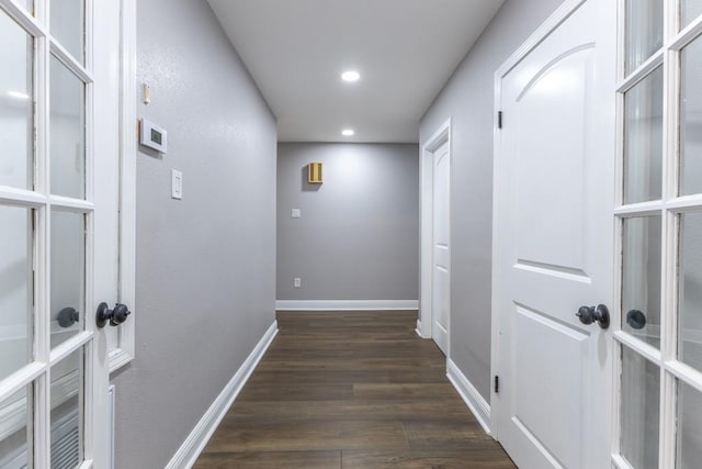 3701 Red Cypress Dr, New Orleans, LA 70131 - hall with dark wood-style flooring, recessed lighting, and baseboards
