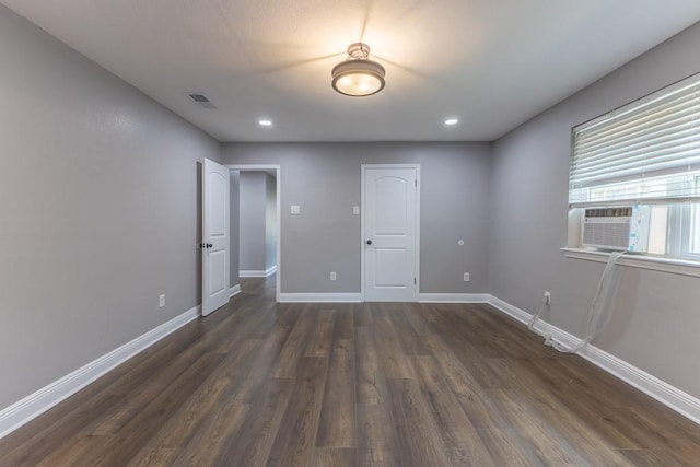 3701 Red Cypress Dr, New Orleans, LA 70131 - spare room with dark wood-type flooring, baseboards, and recessed lighting