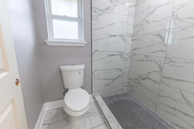 3701 Red Cypress Dr, New Orleans, LA 70131 - bathroom with marble finish flooring, toilet, a marble finish shower, and baseboards