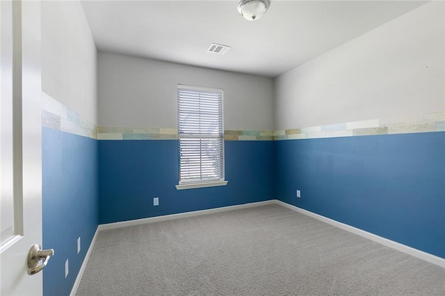 728 Lakeshore Village Dr, Slidell, LA 70461 - spare room with baseboards and carpet flooring