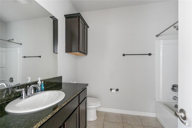 728 Lakeshore Village Dr, Slidell, LA 70461 - full bathroom with vanity, toilet, bathing tub / shower combination, tile patterned flooring, and baseboards