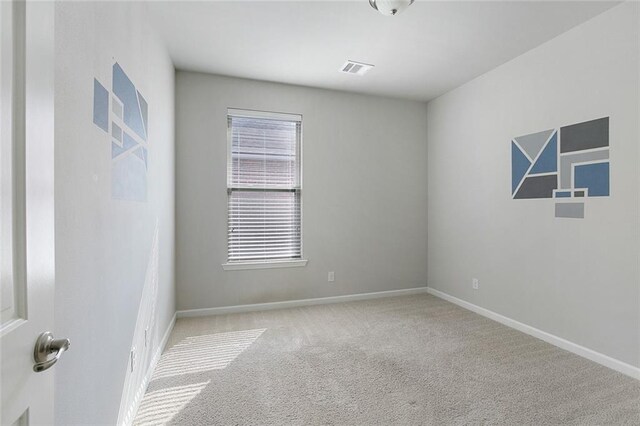 728 Lakeshore Village Dr, Slidell, LA 70461 - spare room featuring carpet floors and baseboards