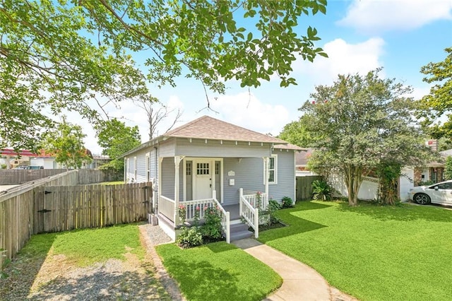 220 Moss Ln, River Ridge, LA 70123 - shotgun-style home with roof with shingles