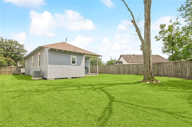 220 Moss Ln, River Ridge, LA 70123 - rear view of property with cooling unit and a shingled roof