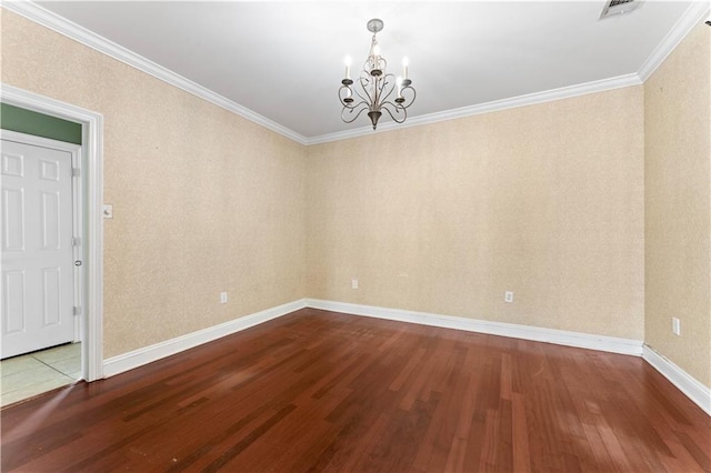 118 Windward Passage St, Slidell, LA 70458 - unfurnished room with a chandelier, wood finished floors, crown molding, and baseboards