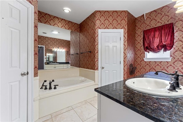 118 Windward Passage St, Slidell, LA 70458 - bathroom featuring vanity, a garden tub, tile patterned floors, and wallpapered walls