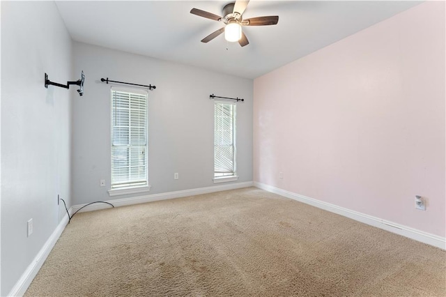 118 Windward Passage St, Slidell, LA 70458 - spare room featuring carpet, baseboards, and ceiling fan