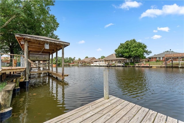 118 Windward Passage St, Slidell, LA 70458 - dock area featuring a water view and a residential view
