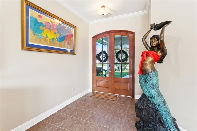422 Kensington Blvd, Slidell, LA 70458 - foyer featuring french doors, baseboards, crown molding, arched walkways, and dark tile patterned floors