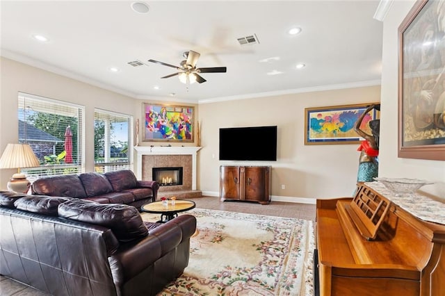 422 Kensington Blvd, Slidell, LA 70458 - living room with baseboards, ceiling fan, a warm lit fireplace, crown molding, and recessed lighting
