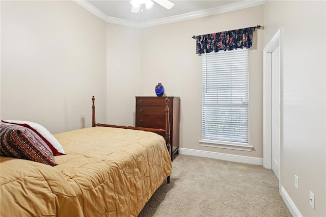422 Kensington Blvd, Slidell, LA 70458 - bedroom with crown molding, light carpet, baseboards, and a ceiling fan