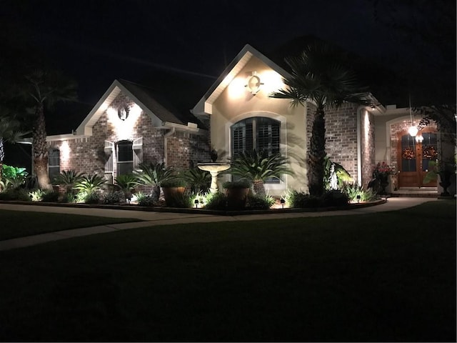 422 Kensington Blvd, Slidell, LA 70458 - view of front facade featuring brick siding