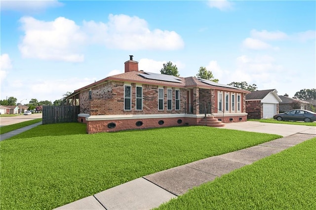 4060 S Windmere St, Harvey, LA 70058 - single story home featuring solar panels, brick siding, crawl space, and a front yard