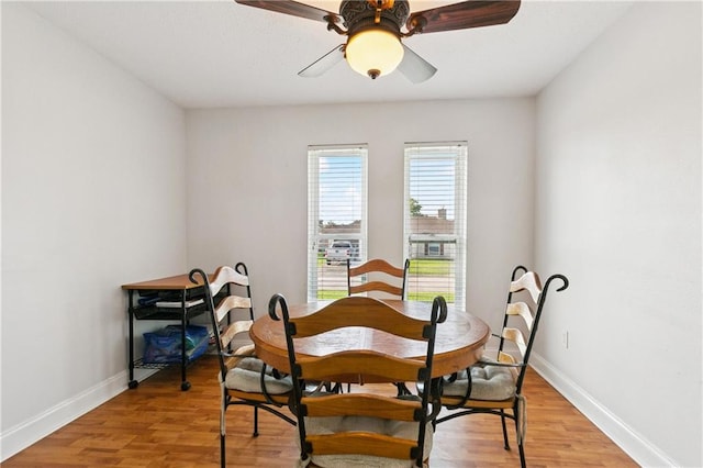 4060 S Windmere St, Harvey, LA 70058 - dining area featuring light wood-style flooring, baseboards, and ceiling fan
