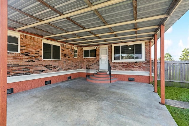 4060 S Windmere St, Harvey, LA 70058 - view of patio featuring entry steps and a carport