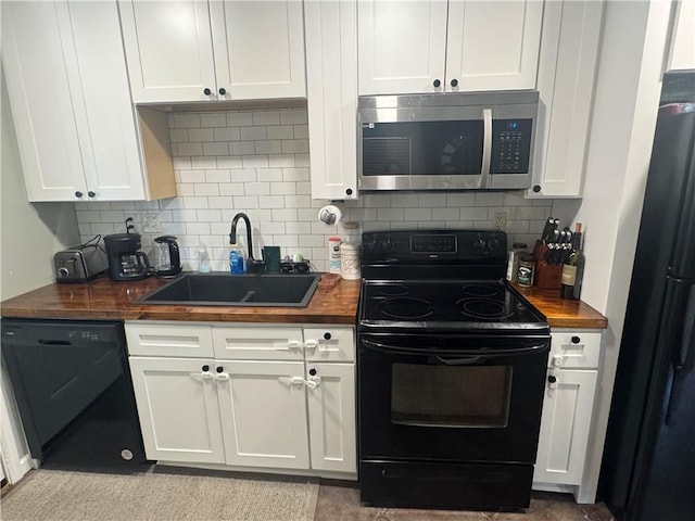 6035-37 Colbert St, New Orleans, LA 70124 - kitchen with black appliances, wood counters, a sink, and decorative backsplash