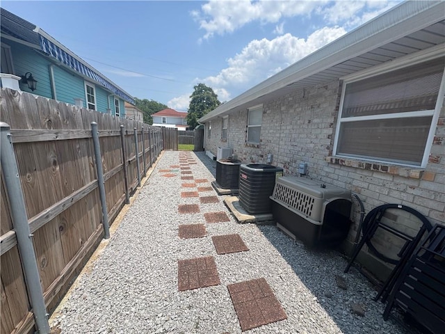 6035-37 Colbert St, New Orleans, LA 70124 - fenced backyard featuring cooling unit