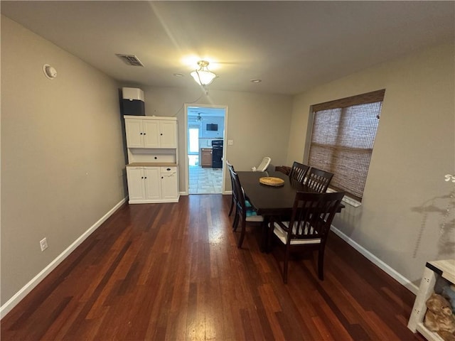 6035-37 Colbert St, New Orleans, LA 70124 - dining room with dark wood-type flooring and baseboards
