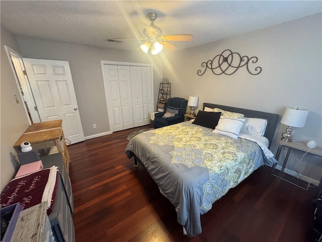 6035-37 Colbert St, New Orleans, LA 70124 - bedroom featuring wood finished floors, a closet, ceiling fan, baseboards, and a textured ceiling