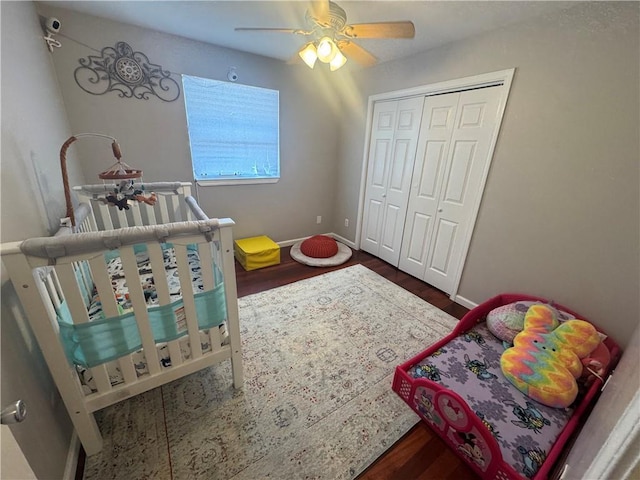 6035-37 Colbert St, New Orleans, LA 70124 - bedroom with wood finished floors, a ceiling fan, a closet, and baseboards