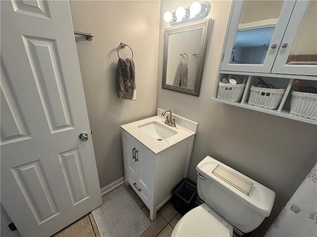 6035-37 Colbert St, New Orleans, LA 70124 - half bath with vanity, toilet, and tile patterned floors