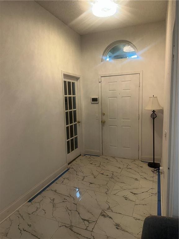 2227 Pine Valley Dr, La Place, LA 70068 - entryway featuring baseboards and light marble finish flooring