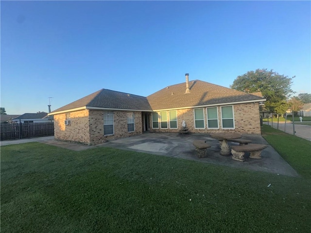 2227 Pine Valley Dr, La Place, LA 70068 - rear view of house with brick siding, a patio area, and a shingled roof