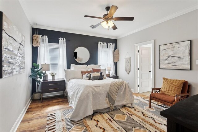 139 Abita Oaks Loop, Abita Springs, LA 70420 - bedroom featuring wood finished floors, crown molding, baseboards, and ceiling fan