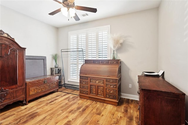 139 Abita Oaks Loop, Abita Springs, LA 70420 - bedroom featuring wood finished floors, baseboards, and a ceiling fan