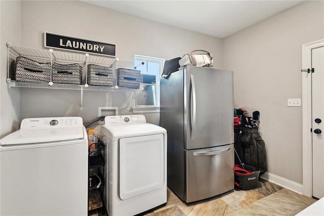 139 Abita Oaks Loop, Abita Springs, LA 70420 - laundry room featuring independent washer and dryer and baseboards