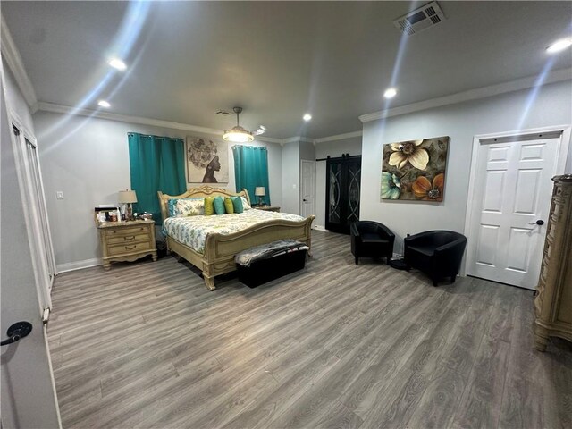 131 Belle Grove Dr, La Place, LA 70068 - bedroom with recessed lighting, ornamental molding, wood finished floors, and a ceiling fan