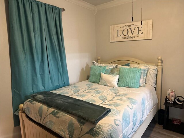 131 Belle Grove Dr, La Place, LA 70068 - bedroom with crown molding and wood finished floors
