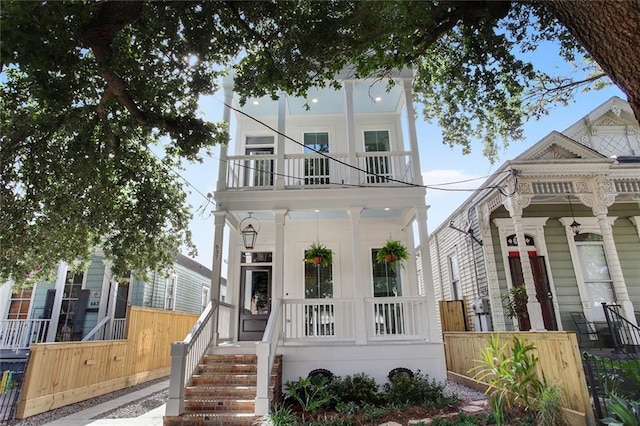 637 S Dupre St, New Orleans, LA 70119 - view of front facade with covered porch and a balcony