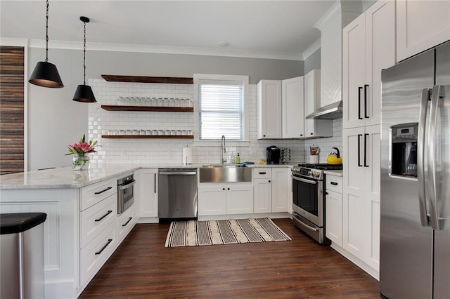 637 S Dupre St, New Orleans, LA 70119 - kitchen featuring stainless steel appliances, a peninsula, ornamental molding, a sink, and backsplash