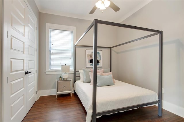 637 S Dupre St, New Orleans, LA 70119 - bedroom featuring dark wood-style floors, baseboards, and ceiling fan