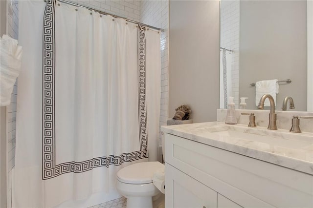 637 S Dupre St, New Orleans, LA 70119 - bathroom with toilet, vanity, and a shower with curtain