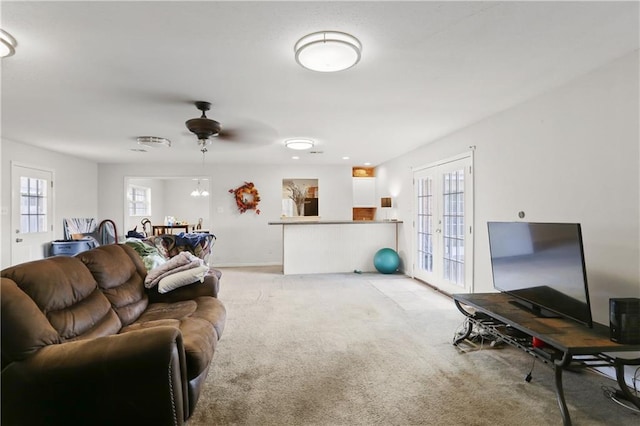 709 Fielding Ave, Gretna, LA 70056 - living area featuring plenty of natural light, light colored carpet, and french doors