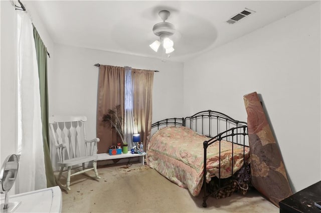 709 Fielding Ave, Gretna, LA 70056 - bedroom featuring unfinished concrete floors and a ceiling fan