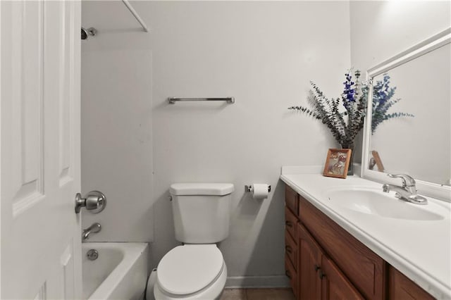 709 Fielding Ave, Gretna, LA 70056 - bathroom featuring vanity, toilet, baseboards, and tub / shower combination