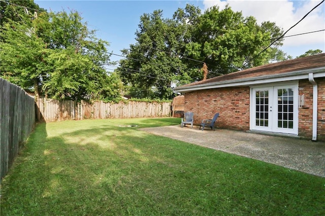 709 Fielding Ave, Gretna, LA 70056 - view of yard with french doors and a patio