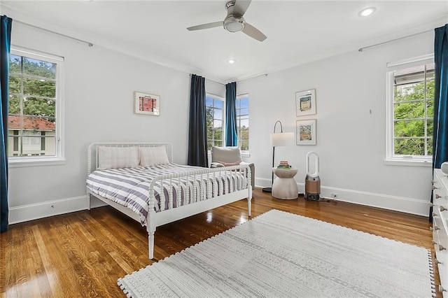 3 Fairview Ct, Metairie, LA 70005 - bedroom with baseboards, multiple windows, wood finished floors, and recessed lighting