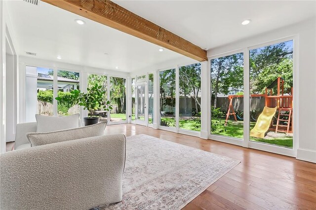 3 Fairview Ct, Metairie, LA 70005 - unfurnished sunroom featuring beam ceiling, wood finished floors, and recessed lighting