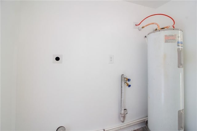 208 Magnolia Ave, La Place, LA 70068 - laundry area with electric dryer hookup and water heater