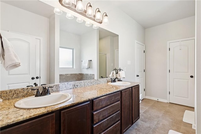 724 Fairfield Loop, Slidell, LA 70458 - full bathroom featuring double vanity, an enclosed shower, and baseboards