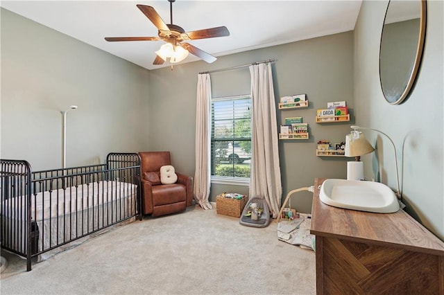 724 Fairfield Loop, Slidell, LA 70458 - bedroom with carpet flooring, a nursery area, and ceiling fan