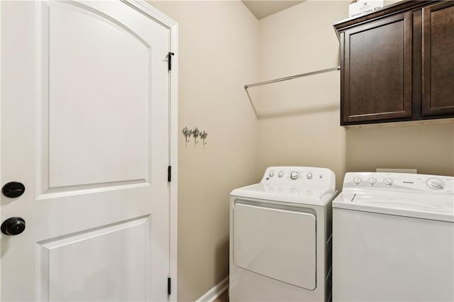 724 Fairfield Loop, Slidell, LA 70458 - washroom with cabinet space and separate washer and dryer
