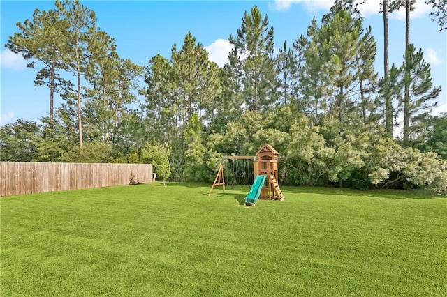 724 Fairfield Loop, Slidell, LA 70458 - view of yard featuring a playground and view of scattered trees